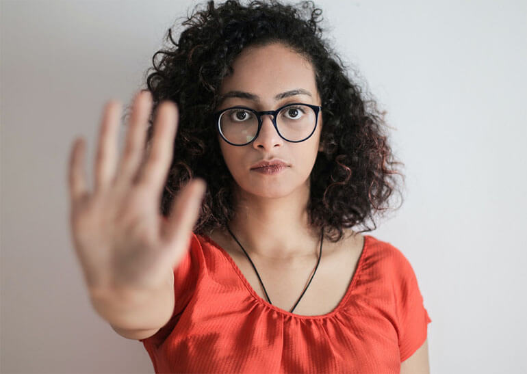 Woman in Stop Gesture